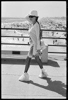 https://ed-templeton.com/files/gimgs/th-153_WOman with plastic bags over shoes HB pier V2.jpg